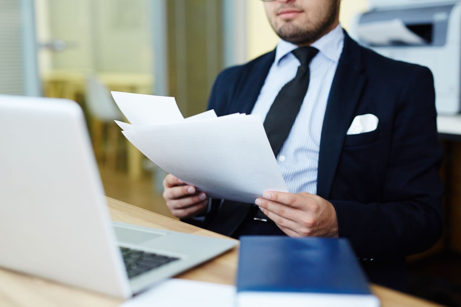 a lawyer looking at documents