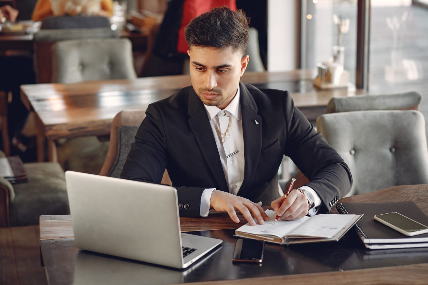 a lawyer writing down notes