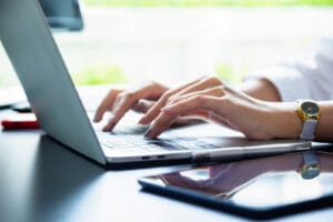 a businesswoman using a laptop