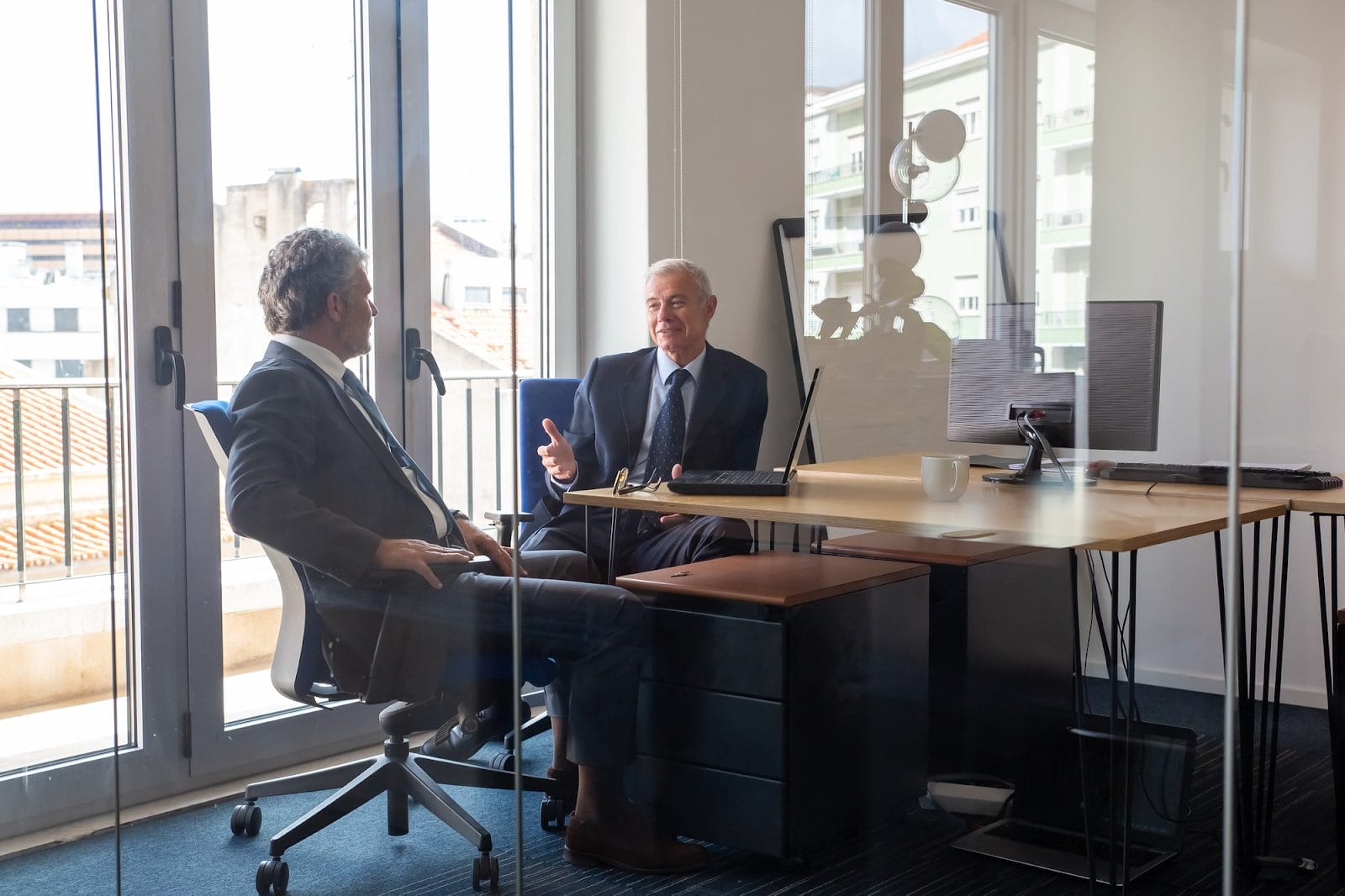 Two businessmen in a meeting