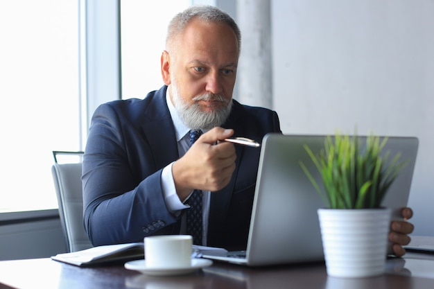 Litigation lawyer using a laptop