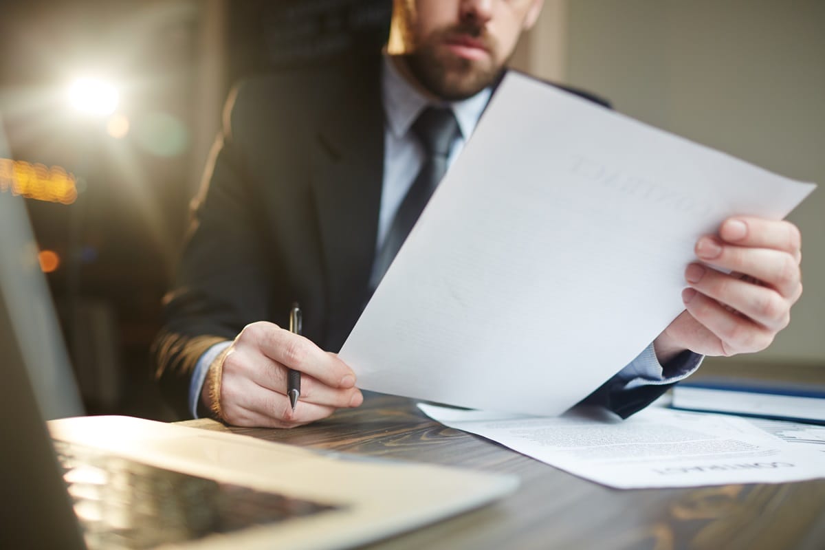 Lawyer looking at a piece of paper