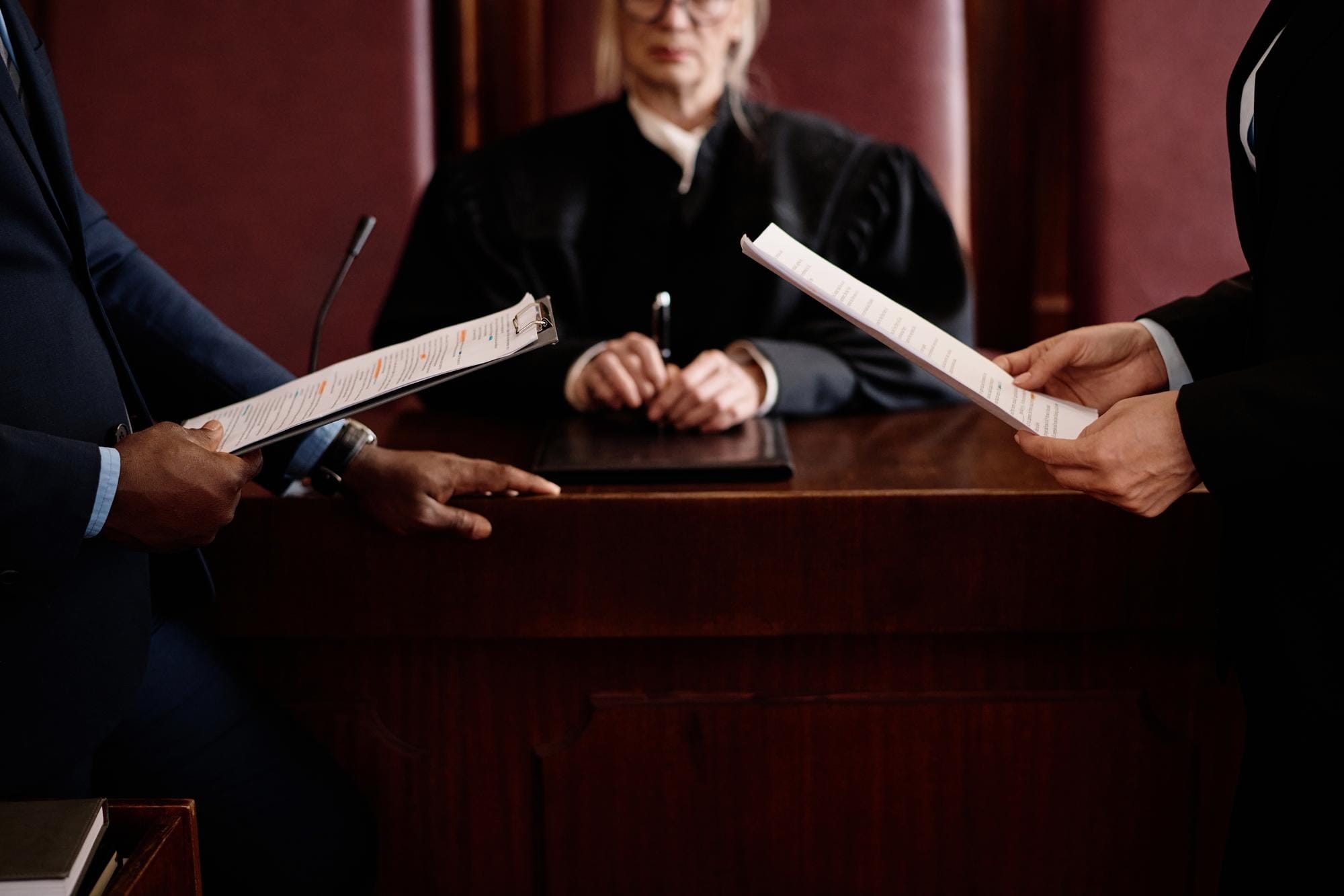 Person holding a documentary inside of the trial court