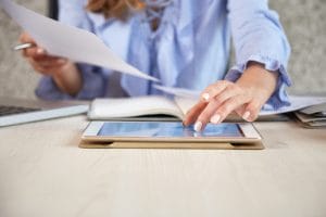 business woman working on an ipad