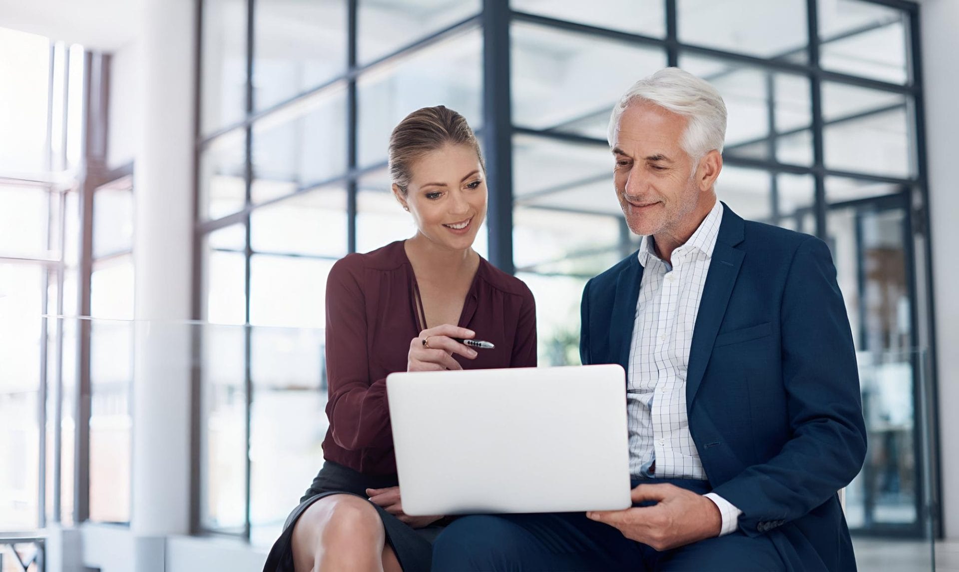 man and woman in a meeting