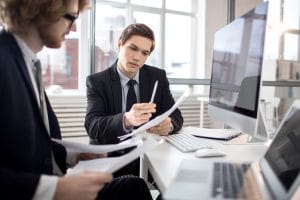 Two lawyers using legal software