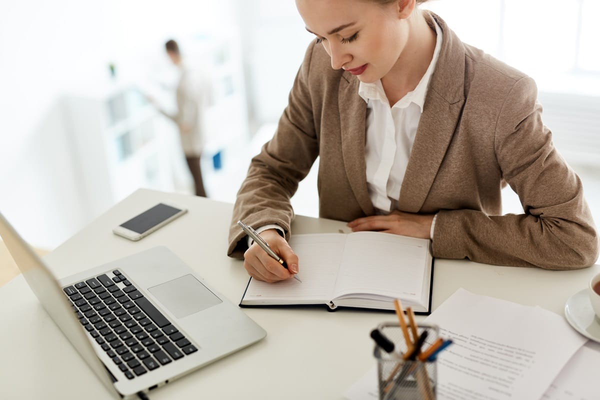 A paralegal working on documents