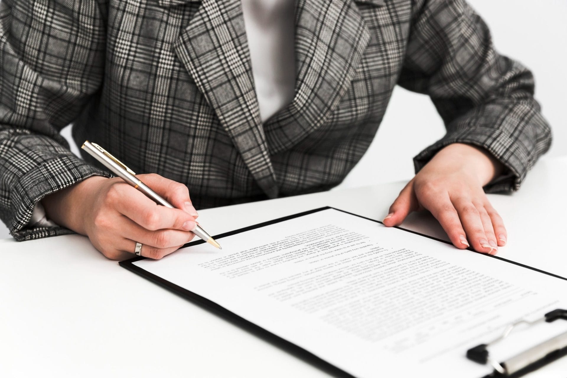 A person signing a contract