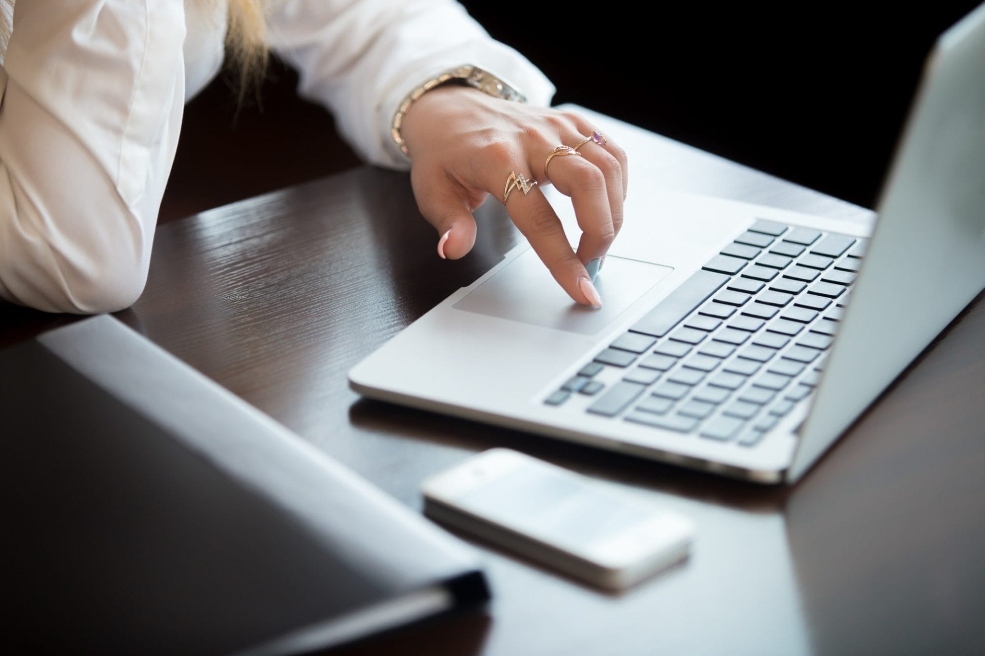 A woman working on a laptop