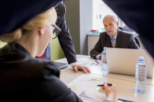 Law firm colleagues communicating in a meeting