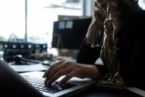 a lawyer working on a laptop