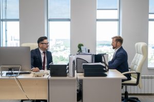 Two Office worker talking