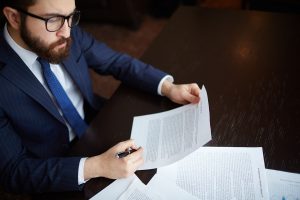 A lawyer going through litigation documents