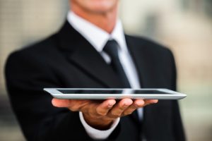 A Person Holding a Tablet