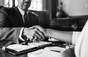 Lawyers shaking hands during arbitration