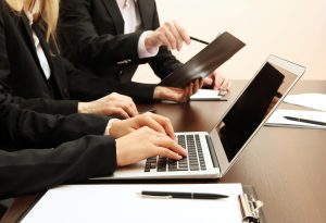 close up of lawyers using a laptop
