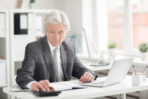 Lawyer calculating eDiscovery costs