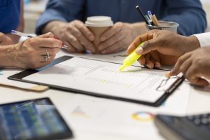 A team of lawyers evaluating an RFP response
