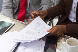 people reviewing documents