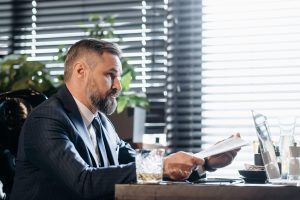 man reviewing legal documents